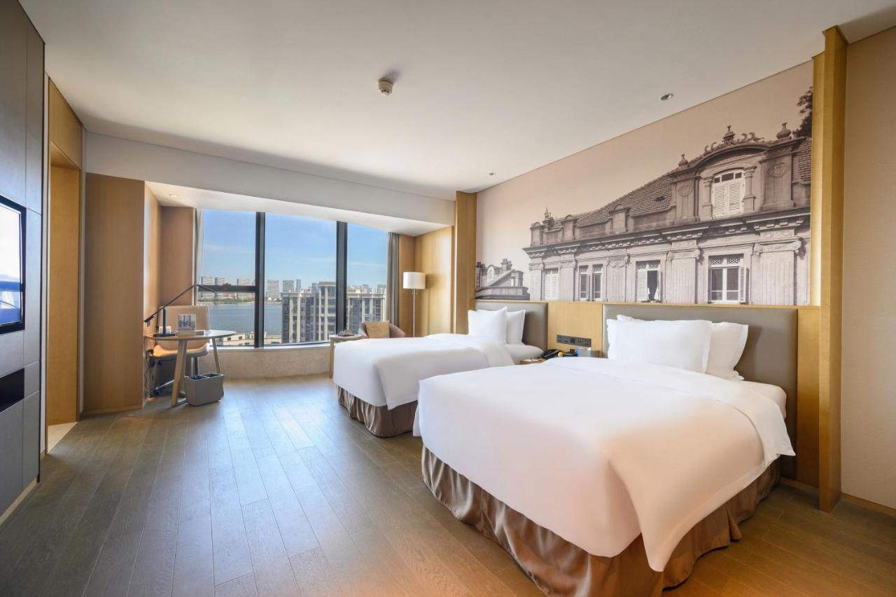 Wyndham Grand Plaza Royale Yuzhou Xiamen Wuyuan Bay Hotell Exteriör bild