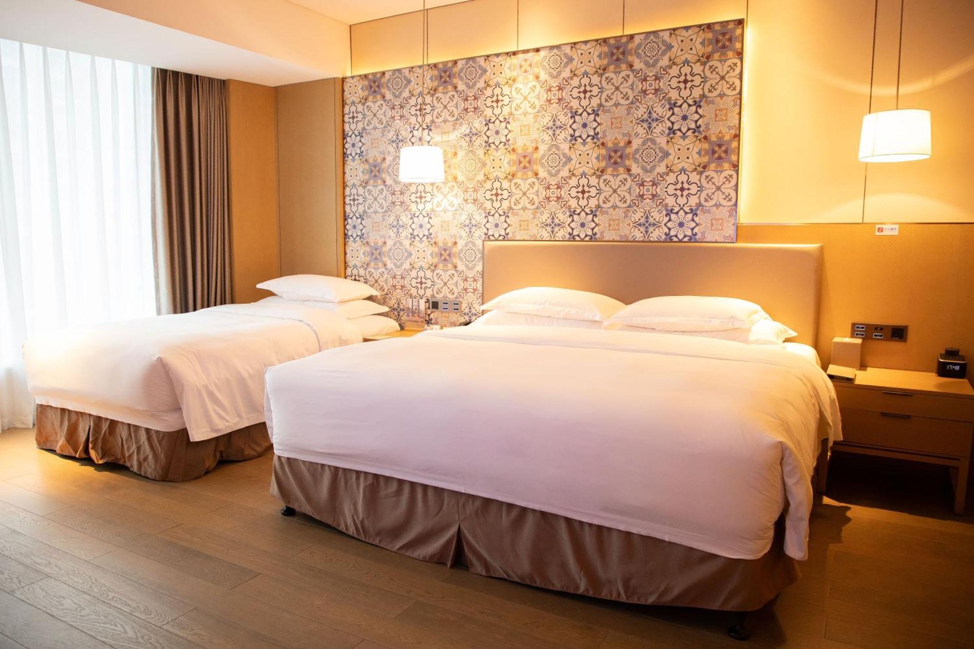 Wyndham Grand Plaza Royale Yuzhou Xiamen Wuyuan Bay Hotell Exteriör bild